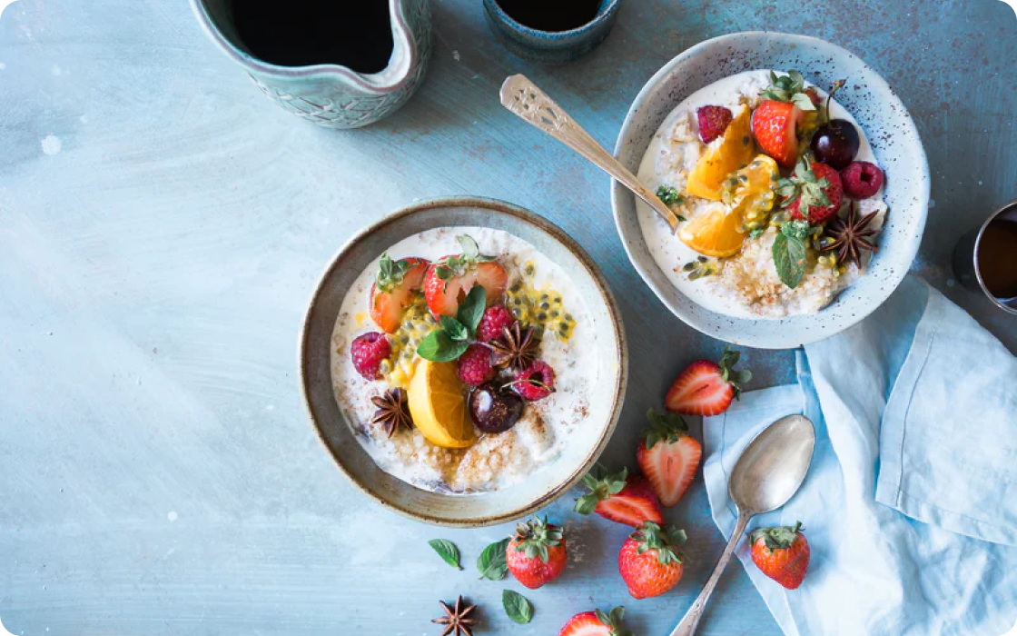 Photo of oatmeal with fruits in a bowl